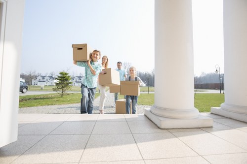 Packing team preparing materials at a client's home